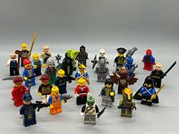 Full group of 26 LEGO minifigures front view