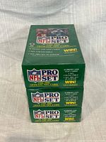 Front view of three stacked sealed wax boxes