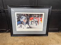 Front view of framed print showing artwork, matting and frame