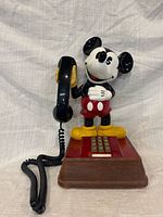 Front view of full Mickey Mouse telephone with handset and cord