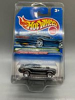 Front view of sealed Hot Wheels Mustang Mach 1 blister card