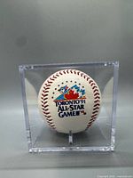 Front view showing Toronto ’91 All-Star Game logo on baseball inside case