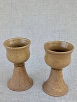 Front view of both goblets showing shape and glaze