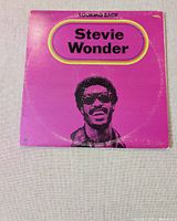 Front cover showing title and artist