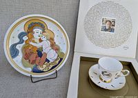 Full lot showing plate on stand, open box, teacup and saucer