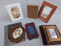 Seven frames grouped together showing overall lot