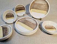 Full set showing stacks of dinner plates, side plates and bowls