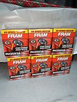 Front view of six boxed FRAM Extra Guard PH3593A oil filters