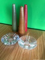 Full set showing two glass candle holders and three ceramic vases