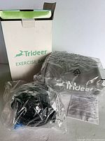 Box, ball in plastic wrap, pump and leaflet visible