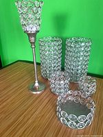 Group shot showing six rhinestone crystal candle holders on table