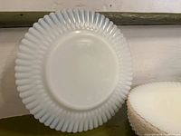 Single plate showing full scalloped design