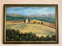 Full view of framed landscape painting