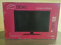 Front of sealed Seiki TV box showing product image and branding
