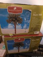 Two Garden Oasis 5-ft palm tree boxes stacked
