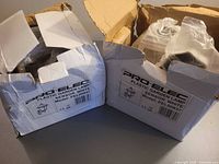 Two original boxes of Pro-Elec plastic garden lamps