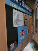 Carton showing branding, model SP2002-2CV and product image