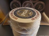 Stacked sealed roll showing PGA 1916 logo and text