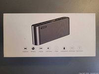 Retail box front showing Antimi speaker image and feature icons