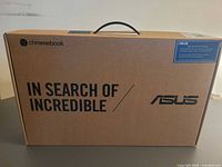 Front of sealed ASUS Chromebook retail box