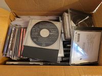 overview of box contents showing mixed CDs and sleeves