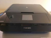 Top view showing entire Canon PIXMA MG7720 printer with touchscreen