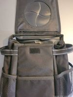 Interior and open lid view showing rubber X-slit and interior lining