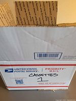 USPS box labelled Cassettes 1