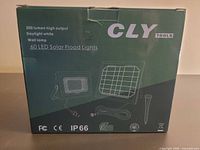 Front of boxed CLY 60 LED Solar Flood Lights