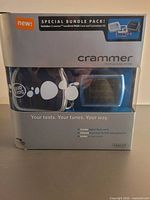 Front view of sealed LeapFrog Crammer package showing handheld and accessories