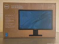 Front of sealed Dell E2015HV monitor box showing product image and branding