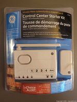Front view of sealed GE Control Center Starter Kit packaging showing included control panel and sensor
