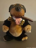 Front view showing overall appearance, cigar, gold ribbon collar