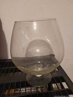 front view of giant clear glass snifter showing overall shape