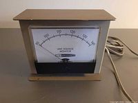 Front view showing entire line voltage monitor and cord