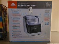 Front French panel of sealed Igloo clear ice maker box