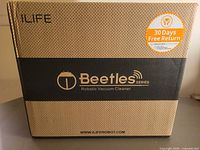 Front of sealed ILIFE Beetles Series A4s vacuum box