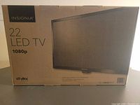 Front of sealed Insignia 22" LED TV box