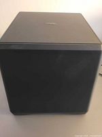 Front/side view of Insignia Rocketboost cube subwoofer