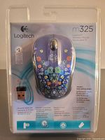 Front of sealed Logitech M325 wireless mouse package