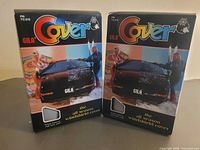 Front view showing two identical boxed Gila windshield covers