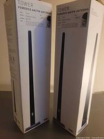 Two sealed retail boxes front view showing product name and image