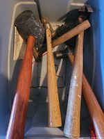 Five hammers including rubber mallet inside tote