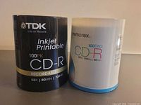 Front view of both sealed CD-R spindles showing brand labels and capacities