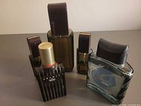 Group shot of all five fragrance bottles