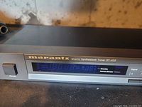 Front panel showing model, display and controls