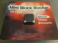 Front display card showing product name and speaker in blister