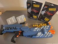 Full lot showing blaster, two ammo boxes, two storage cases