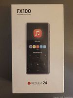 Front of sealed Akamate FX100 REDdot 24 MP3 player retail box