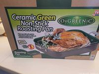 Front of boxed OrGREENiC Ceramic Green Non-Stick Roasting Pan showing product and features